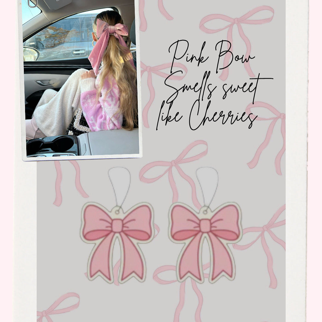 Car interior with a person wearing a pink bow in their hair, accompanied by pink bow illustrations and text on a white background.