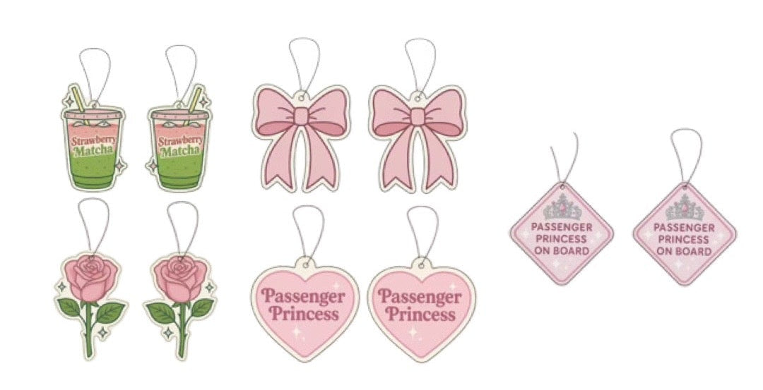 Set of decorative car air fresheners with various designs on a white background