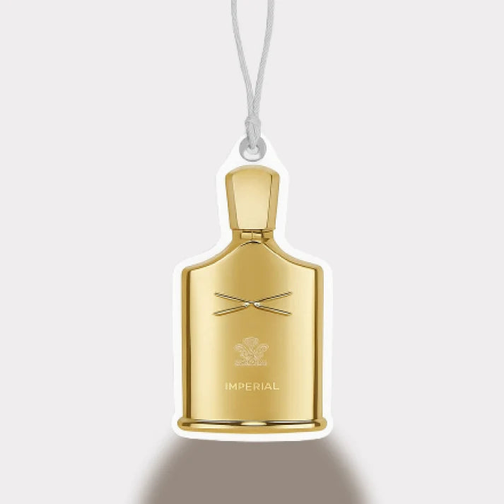 Gold bottle-shaped ornament with 'Imperial' branding on a white background